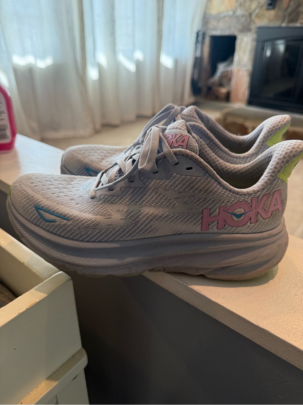 Hoka Gray Running Shoes with Pink Logo and Blue Accent